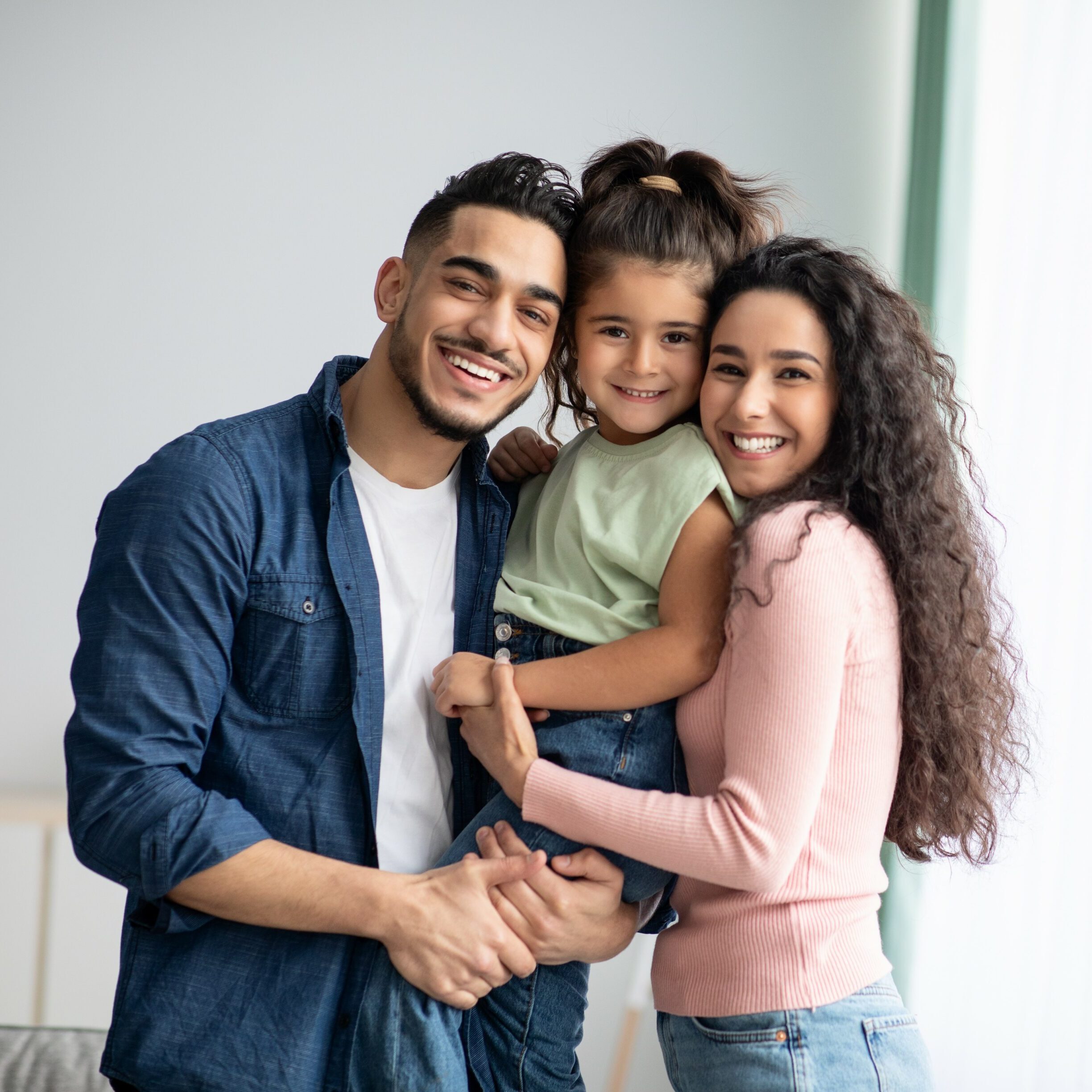 Portraif,Of,Happy,Arabic,Parents,Posing,With,Their,Little,Daughter