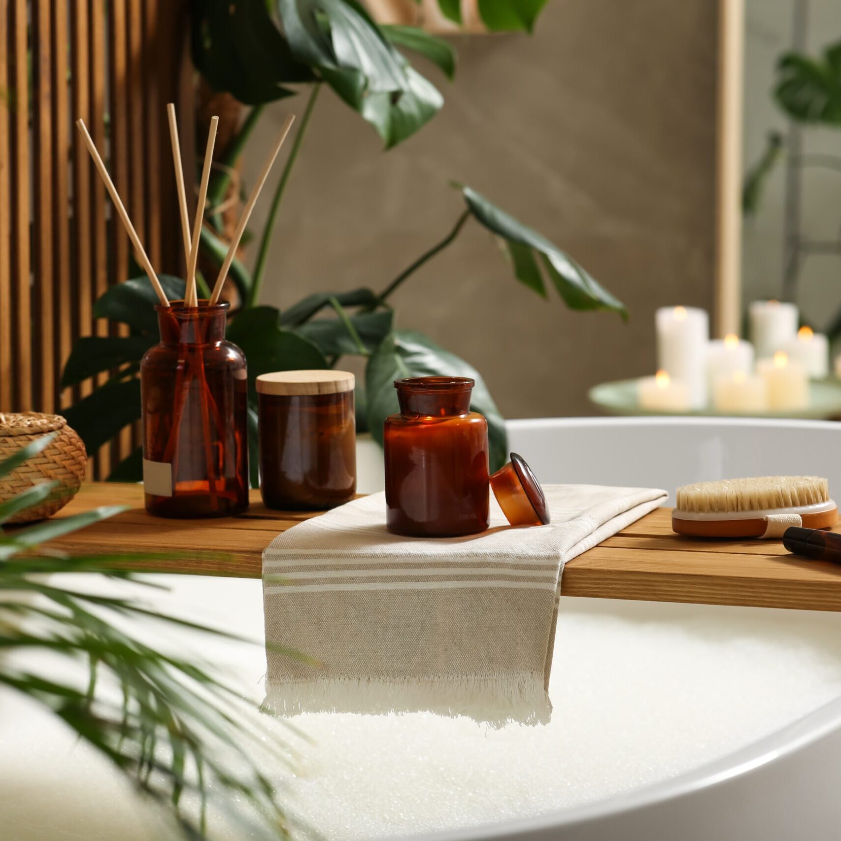 Wooden,Bath,Tray,With,Open,Book,,Candle,And,Body,Care